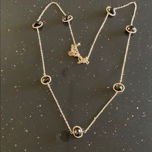 Black bead wrapped station necklace